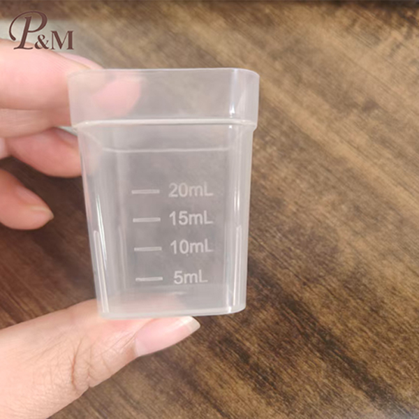 Moldeo de tazas de medición resistente al calor